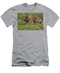 Hyena Carries Off Its Wildebeest Trophy Rolf Jacobson T-Shirt